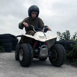 Photograph of Child riding a quad bike around our track